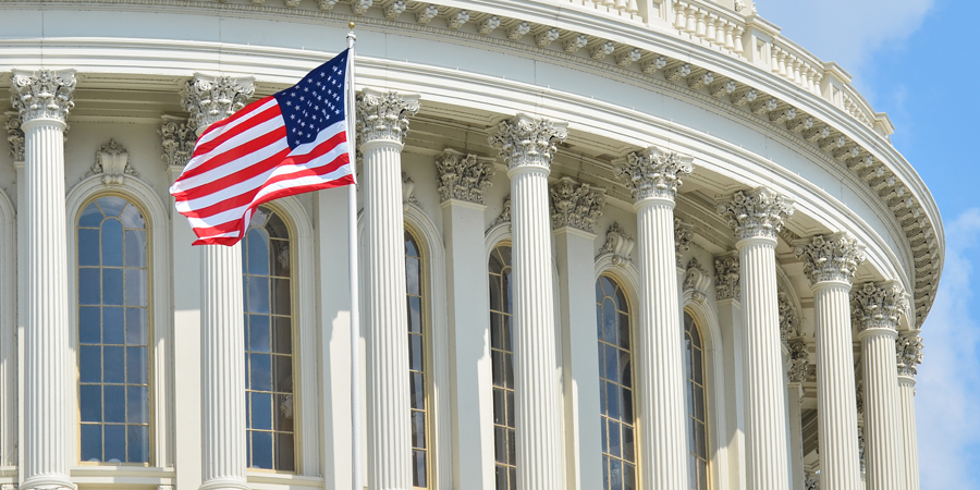 Government Building with American Flag during the day