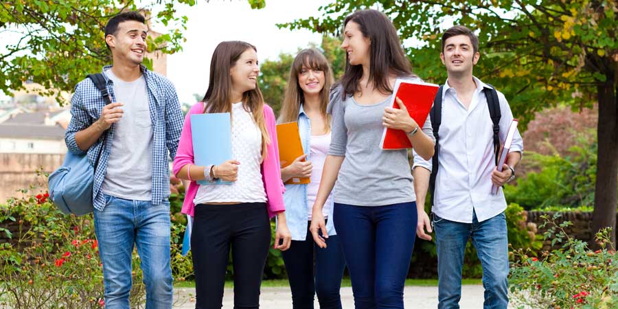 College students walking outdoors at the a university